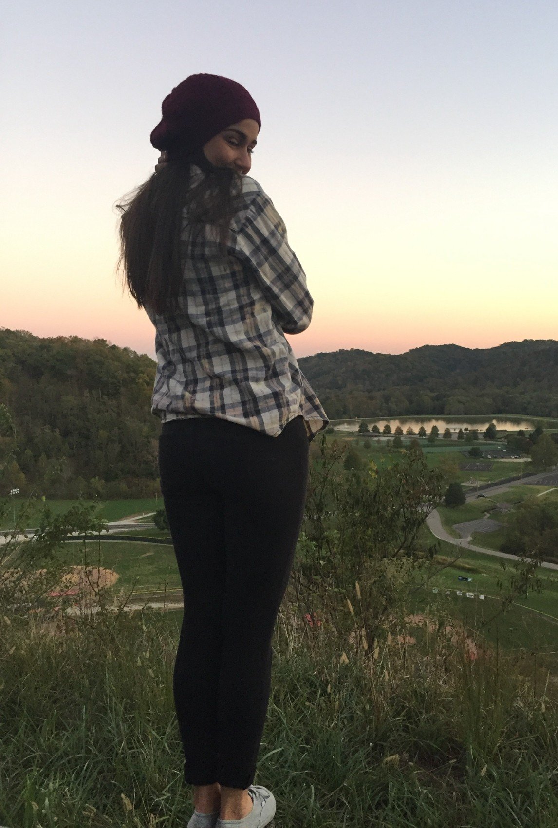 Shannon on Overlook Trail at Barboursville Park, looking back over the valley at dusk